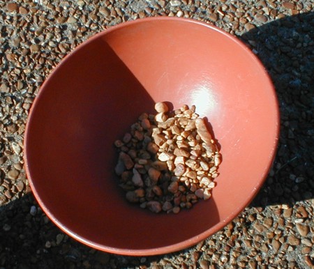[Lining Bottom of Bowl with Gravel]